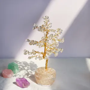 Arbre de vie en cristal naturel fait main avec des éclats de quartz dans un bol en verre