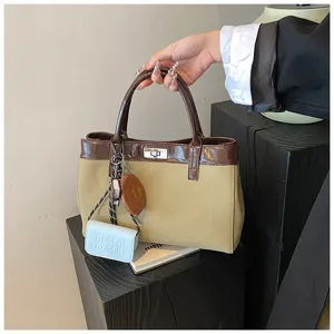 Retro color-block faux suede tote bag with metal lock closure and MASBA pouch charm detail