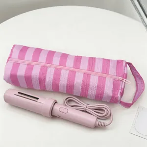 Grande borsa da viaggio a righe rosa per asciugacapelli con ferro arricciacapelli rosa
