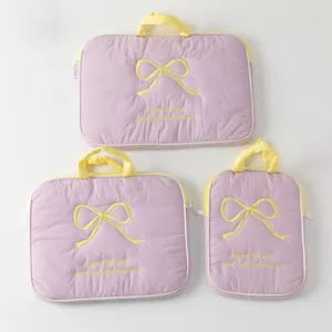 Set de fundas acolchadas para portátil lavanda en tres tamaños con bordado de lazo
