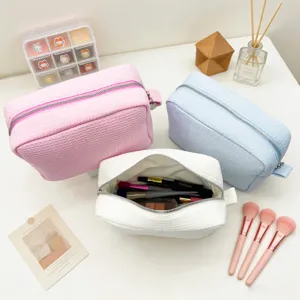 Set de neceseres de gofre en rosa, azul y blanco con gran capacidad para cosméticos