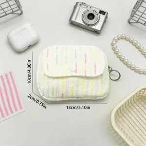 Close-up detail of the mini tweed flap coin purse with 13x10x2cm size annotations