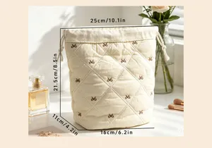 Detailed dimensions of quilted drawstring makeup bag with bow embroidery