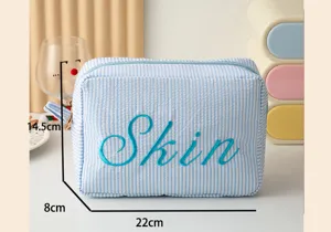 Trousse de toilette rayée bleue grande capacité avec broderie Skin, dimensions 22x14,5x8cm