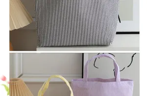 Detailed view of large striped seersucker tote bags in yellow, purple, and black.