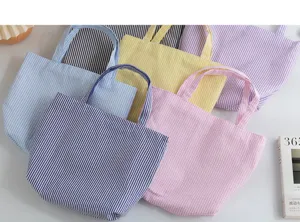 Collection of high capacity colorful striped canvas tote bags for summer shopping