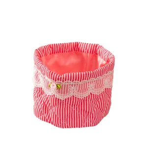 Korean style quilted fabric storage basket with red and white stripes and lace trim