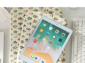 Detailed macro view of floral quilted tablet sleeve accessory for students and office