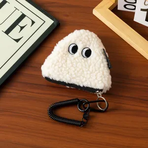 Macro view of the white fluffy onigiri coin purse featuring cute embroidered eyes