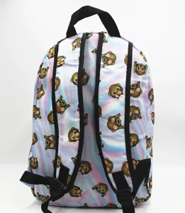 Detalle de una mochila para estudiantes con lindo patrón de emoji de mono y correas