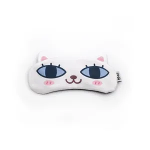 Close-up of a cute cartoon cat eye mask with blue eyes and pink cheeks for sleeping
