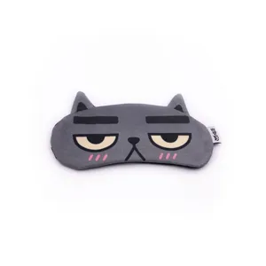 Detail shot of a gray cartoon cat eye mask with soft plush fabric and grumpy expression