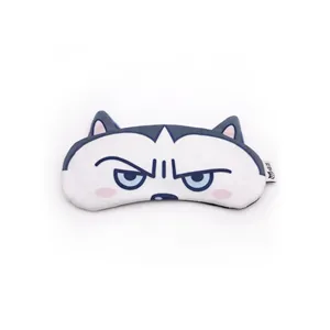 Close-up of the cute husky expression on a cartoon sleep mask with soft fabric texture