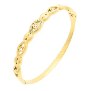 Gouden roestvrijstalen scharnier armband met boze oog en kristalstenen voor dames.