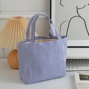 Retro blue and white vertical striped canvas tote bag with large capacity for daily use