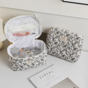 Elegant floral quilted cosmetic bags with interior mesh organizers for travel skincare storage