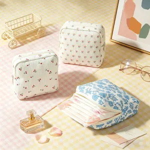 Borsa porta assorbenti in velluto a coste, trousse per cosmetici floreale con cerniera.