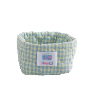 Panier de rangement en tissu matelassé avec motif à carreaux vichy bleu et jaune