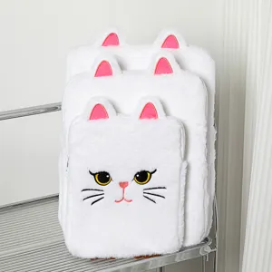 Macro view of three different sized white plush cat-themed laptop sleeves and iPad bags