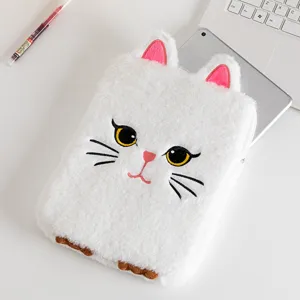 Close-up of white plush cat-themed iPad sleeve showing soft texture and fine embroidery