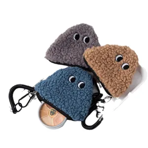 Cute plush onigiri coin purses with googly eyes and spiral keychain charms in 3 colors