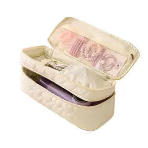 Large capacity travel storage bag for hair dryer with quilted heart pattern