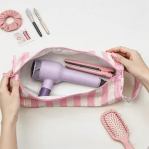 Borsa da viaggio a righe grande capacità con asciugacapelli e strumenti styling