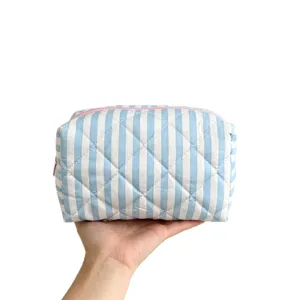 Large capacity handheld quilted striped cosmetic bag in light blue and white design