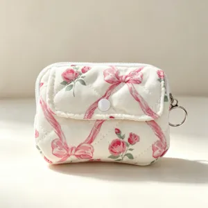 Mini bolsa de almacenamiento acolchada con estampado de flores y lazos para auriculares