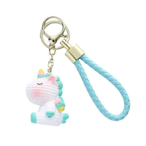 Adorable resin unicorn keychain with a light blue woven leather strap for bag pendant