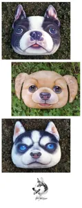 Vista detallada de tres cojines con forma de cabeza de perro en 3D sobre fondo de hierba verde