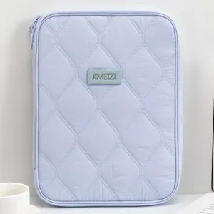 Detailed view of the quilted texture on this light purple 11 inch tablet sleeve.