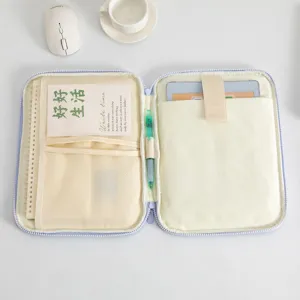 Detail view of internal compartments of a minimalist 11-inch tablet organizer sleeve