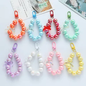 Llavero Lindo de Lazo de Perlas de Color Caramelo Cadena de Teléfono de Acrílico Iridiscente Colante de Bolso para Niñas Mochila Funda Auriculares Decoración