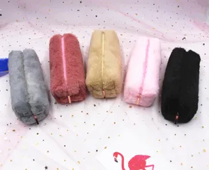 Detailed view of plush octagonal pencil cases in multiple colors and soft textures