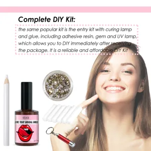 Kit complet de strass dentaire DIY avec lampe de polymérisation et résine adhésive.