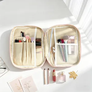 Bolsa de maquillaje de viaje portátil de gran capacidad con compartimentos para pinceles
