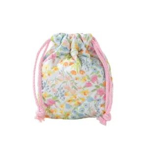 Quilted floral drawstring makeup bag with pink ropes for portable storage and travel use
