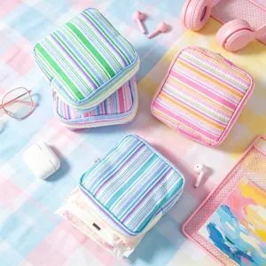 Portable seersucker striped pouch for menstrual pads, lipsticks and small accessories