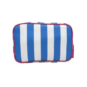 Grande borsa cosmetica da viaggio a righe blu e bianche con profili rosa e nappa rosa