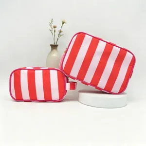 Waterproof red and pink striped travel cosmetic bag set with large capacity and zipper