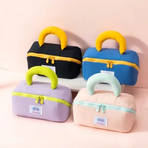 Assorted marshmallow handle pillow cosmetic bags in four colors for travel storage
