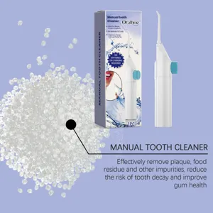 Portable manual tooth cleaner oral irrigator with packaging, ideal for braces and daily dental care.