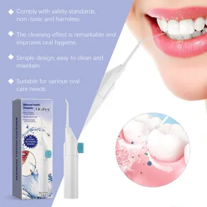 Manual tooth cleaner detail view showing portable oral irrigator design and cleaning features.
