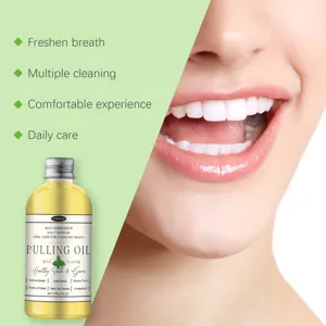 Detailed view of refreshing mint pulling oil bottle with bright clean teeth smiling model background