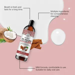 Detail view of Oralhoe herbal oil pulling oral rinse bottle with fresh coconut and cinnamon.