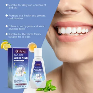 Detailed view of whitening mouthwash bottle and box with fresh mint and lemon extracts.