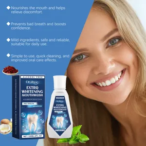 Close-up detail of whitening mouthwash with fresh mint and natural ingredients for bright smile.