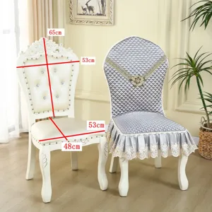 European style dining chair cover with elegant skirt, quilted fabric and delicate lace trim.