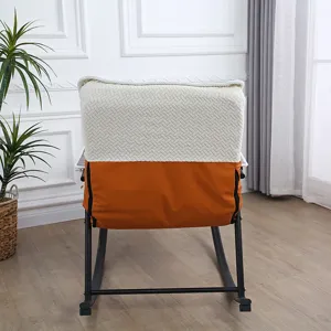 Comfortable rocking chair cushion set with textured backrest and soft fabric for relaxing.